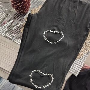 Black Leggings with Heart Embellishments